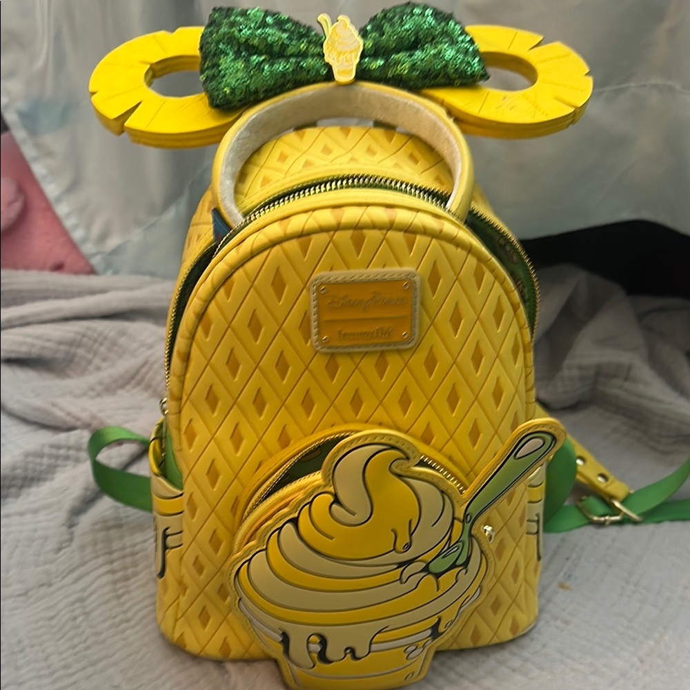 Loungefly Disney Parks Dole Whip backpack with matching Minnie Ears. Used once!